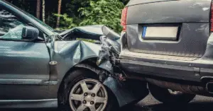 Car crash with front and rear-end damage.