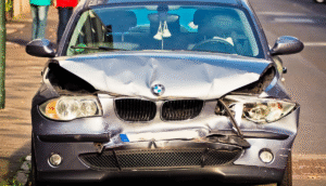 damaged car with broken headlight