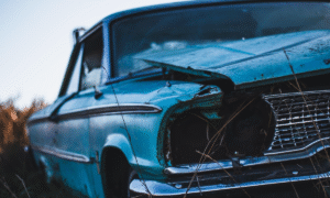 damaged blue color car