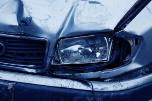 car with a broken headlight